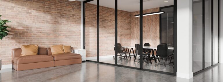 3D modern industrial office interior with brick walls and glass meeting room, showcasing industrial construction Memphis TN s